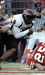 Joel Filani scores against Nebraska in 2005. This year's matchup will be televised on FSN at 2 p.m.