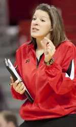 Assistant Coach Beth Falls encourages the squad to make even small adjustments