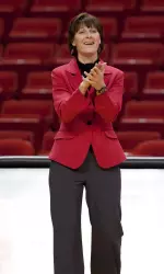 Head Coach Trish Knight gives her squad a hand at a recent match