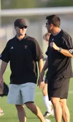Tech head coach Tom Stone and assistant coach Aaron Gordon