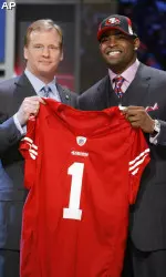 Texas Tech wide receiver Michael Crabtree became the third-highest player drafted in school history when the San Francisco 49ers selected him with the tenth overall pick. (Also Pictured: NFL Commissioner Roger Goodell)