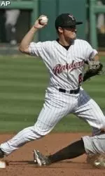 Texas Tech shortstop Joey Kenworthy, left, forces out Missouri's Aaron Senne, right, and throw to first base to complete the double play on a ball hit by Kyle Mach in the seventh inning of a Big 12 baseball tournament game in Oklahoma City, Friday, May 22, 2009. Texas Tech won the game 4-2. (AP Photo)