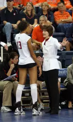 Barbara Conceicao gets mid-match instruction from head coach Trish Knight