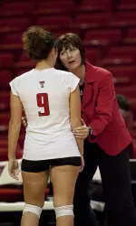 Coach Knight discusses a point with Jenn Goehry