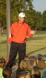 Texas Tech men's tennis head coach Tim Siegel and assistant coach Marcelo Ferreira volunteered their teaching skills with a much younger group of tennis players at Murfee Elementary School