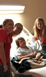 The Tech Softball team visited UMC Children's Hospital on Thursday.
