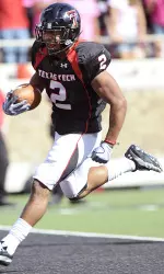 Texas Tech's Cornelius Douglas runs into the end zone against Oklahoma State during the first half