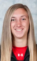 Mickey Kenney begins her career with a home run in her first at bat