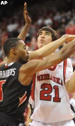 Nebraska's Jorge Brian Diaz gets the ball knocked away by Texas Tech's D'walyn Roberts.
