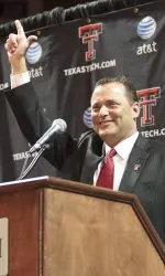 Billy Gillispie gets his Guns Up at today's news conference at the United Spirit Arena.