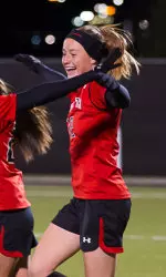 Freshman Janine Beckie connected on two goals Friday night as Texas Tech broke the school record for single season wins with a 2-0 victory over Oklahoma State.