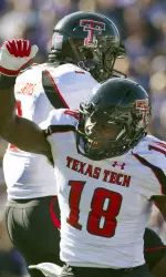 Eric Ward celebrates a touchdown with teammate Tyson Williams.