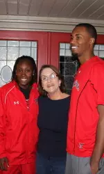 Chynna Brown and Jaye Crockett deliver tickets on Monday.