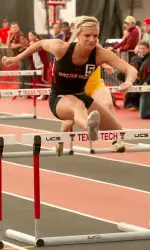 Katie Grimes broke a school record by running an 8.28 in the 60 meter hurdles Friday night.
