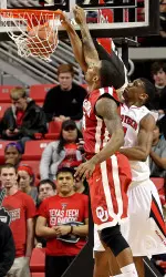 Jordan Tolbert finishes a dunk.