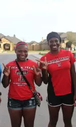 Tiffini Smith, Morgan Johnson and members of the Red Raider Soccer team assisted with the 2012 Parade of Homes Thursday.