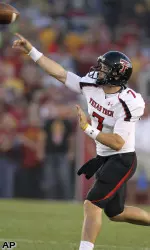 Seth Doege throws a pass during the first half.