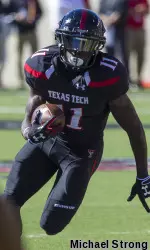 Jakeem Grant carries the ball.