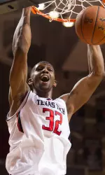 Jordan Tolbert goes up for a dunk.