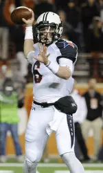 Quarterback Baker Mayfield throws a pass in the first quarter.