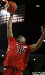 Jaye Crockett goes up for a dunk.