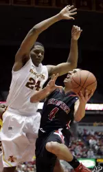 Ty Nurse drives to the basket.