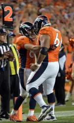 Wes Welker and Manny Ramirez celebrate touchdown.