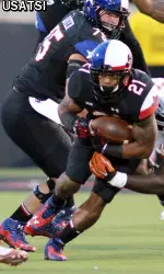 Running back DeAndre Washington in the first half against Texas.