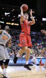 Texas Tech Red Raiders guard Dusty Hannahs (2) shoots as Oklahoma State Cowboys guard Markel Brown (22) defends. (Denny Medley-USA TODAY Sports)