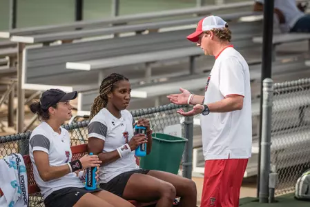 Coach Petty with players