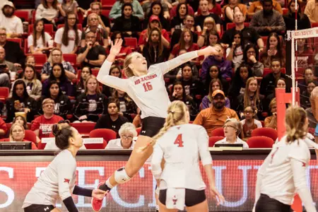 Emily Hill jumping, hitting