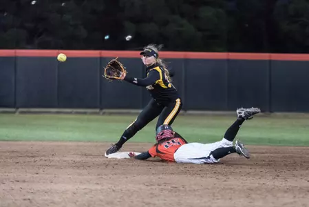 Workman diving into second