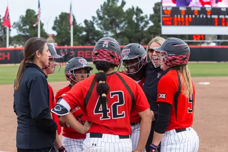 coaches and players talking