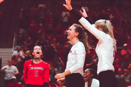 Emerson Solano, Allison White, and Brooke Kanas celebrating