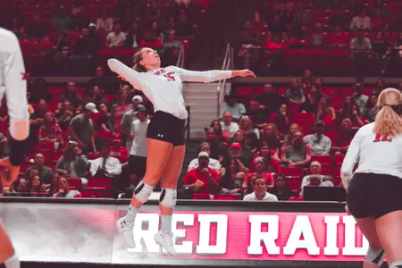 Emily Hill hitting
