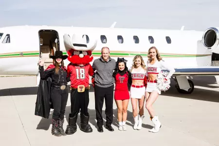 Matt Wells Lubbock cheer raider red masked rider