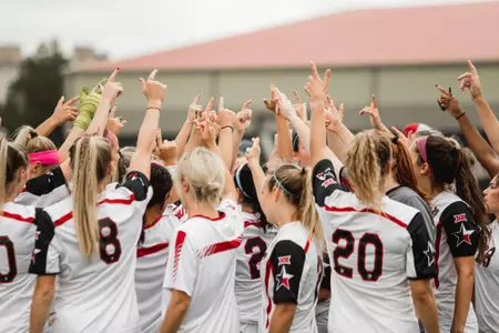 Soccer team huddle
