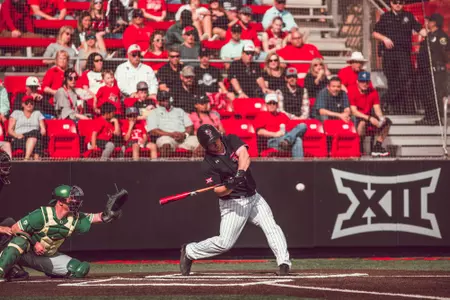 Tanner O'Tremba hitting