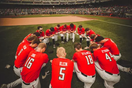Team huddle prayer cws