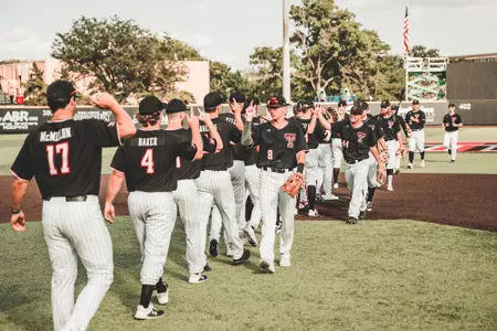 Team postgame high five