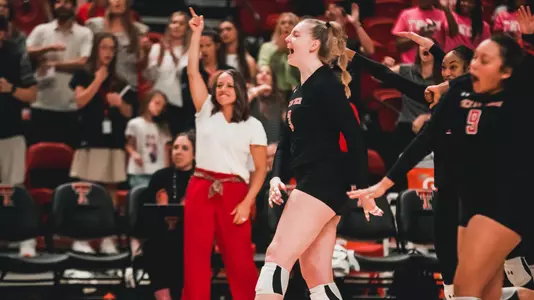 Caitlin Dugan celebrating