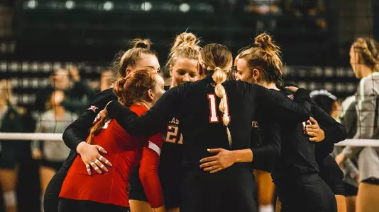 Volleyball team huddle