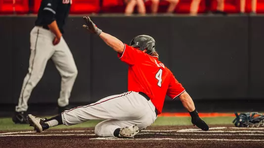 Baker sliding home