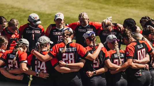 Softball team huddle