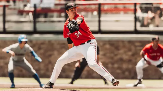 Micah Dallas pitching vs. Kansas