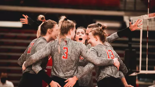 volleyball team huddle celebration