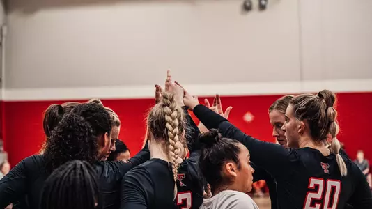 volleyball team huddle