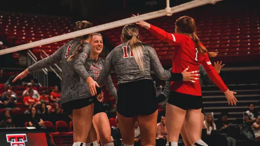 volleyball team huddle