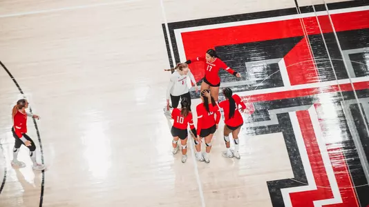Volleyball Team huddle