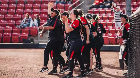 Texas Tech softball celebrates a home run against Northern Colorado